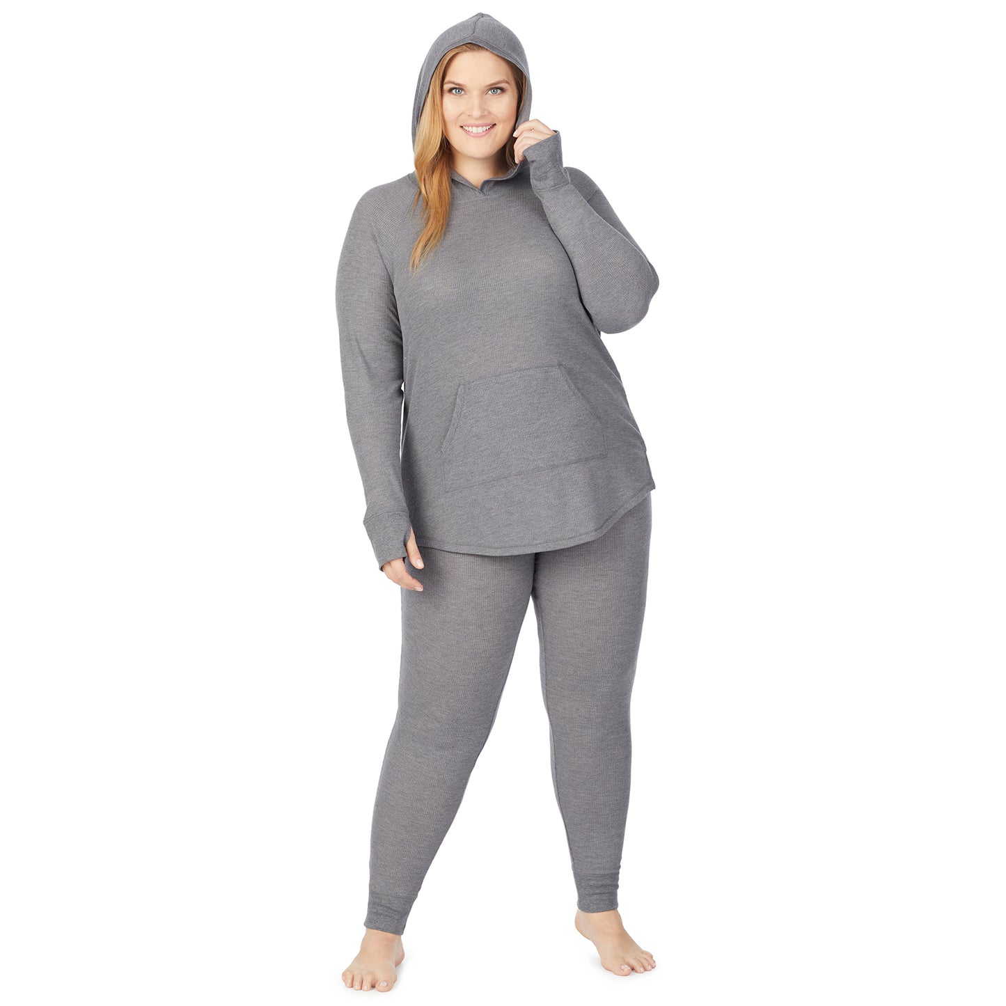 Stone Grey Heather; Model is wearing size 1X. She is 5'9", Bust 38", Waist 36", Hips 48.5". @A lady wearing a stone grey heather long sleeve hoodie tunic plus.