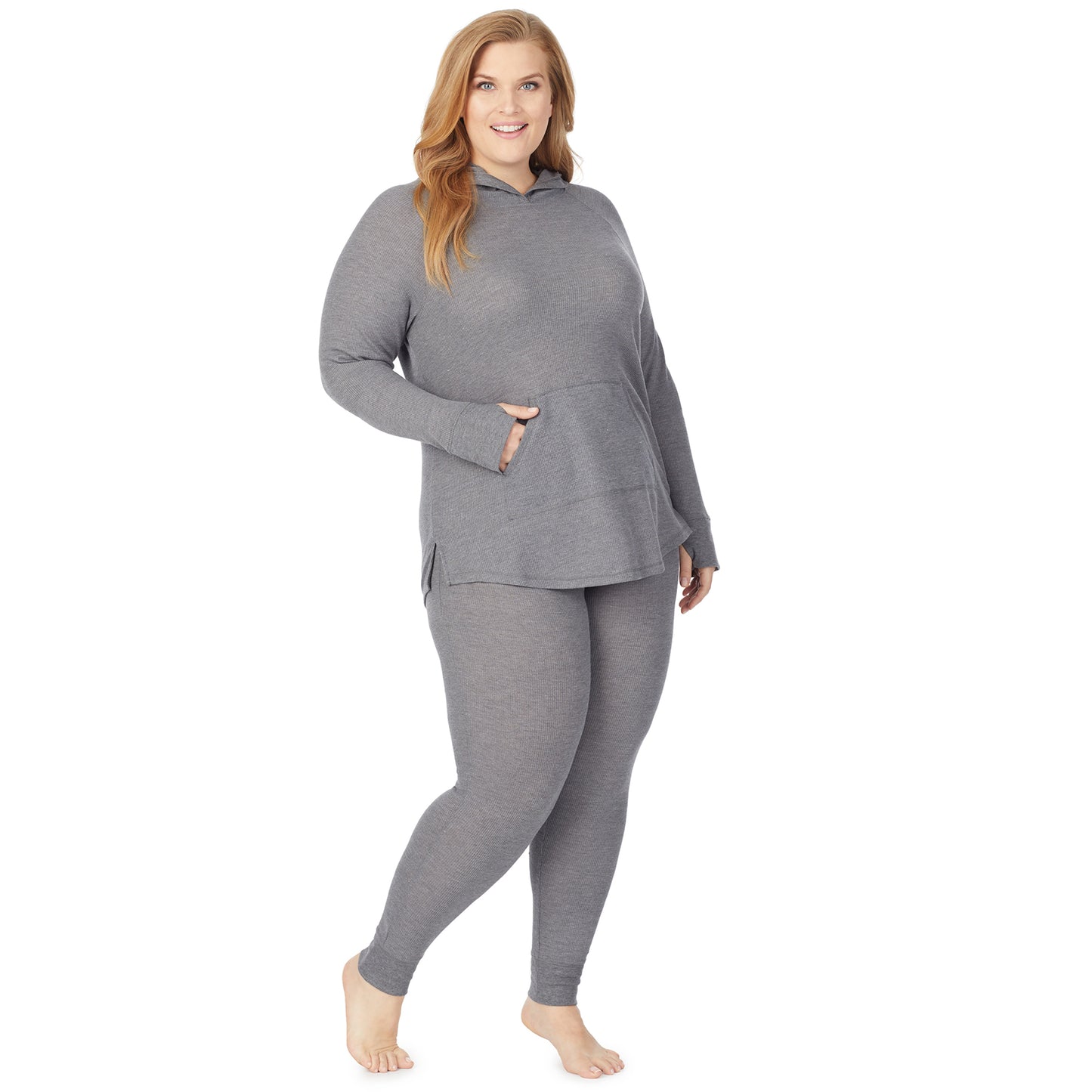 Stone Grey Heather; Model is wearing size 1X. She is 5'9", Bust 38", Waist 36", Hips 48.5". @A lady wearing a stone grey heather long sleeve hoodie tunic plus.