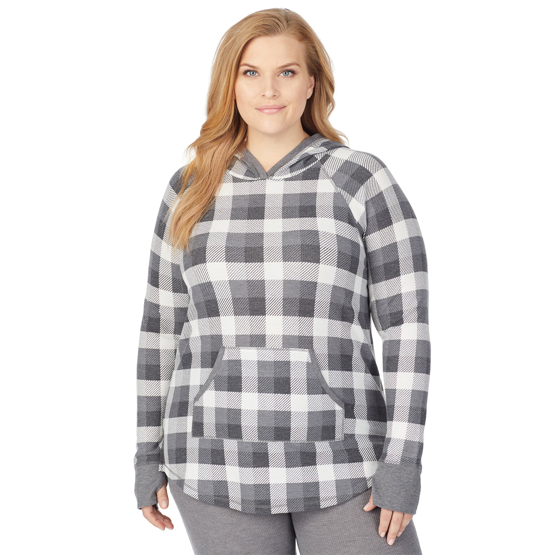A lady wearing a grey buffalo check long sleeve hoodie tunic plus.