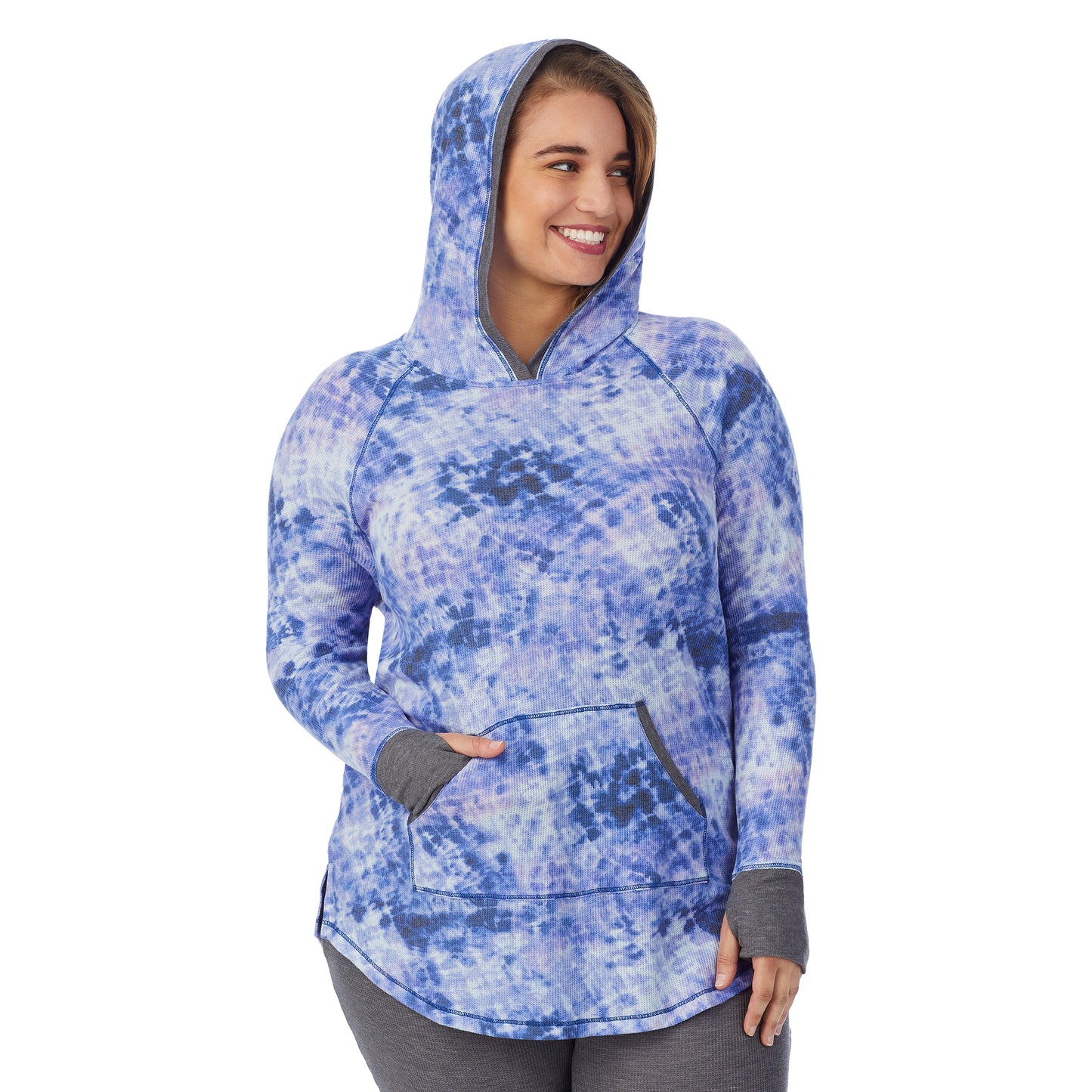 Blue Tie Dye; Model is wearing size 1X. She is 5'7", Bust 42.5", Waist 34.5", Hips 46". @A lady wearing a blue tie dye long sleeve hoodie tunic plus.