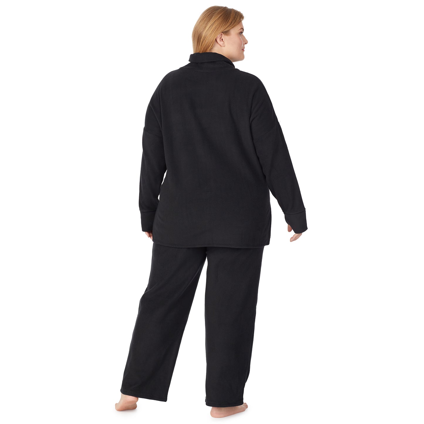 Black; Model is wearing size 1X. She is 5'9", Bust 38", Waist 36", Hips 48.5".@a lady wearing black long sleeve tunic
