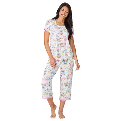 A lady wearing Cotton-Blend Short Sleeve Top with Cropped Pant 2-Pc Pajama Set in Spring Scene