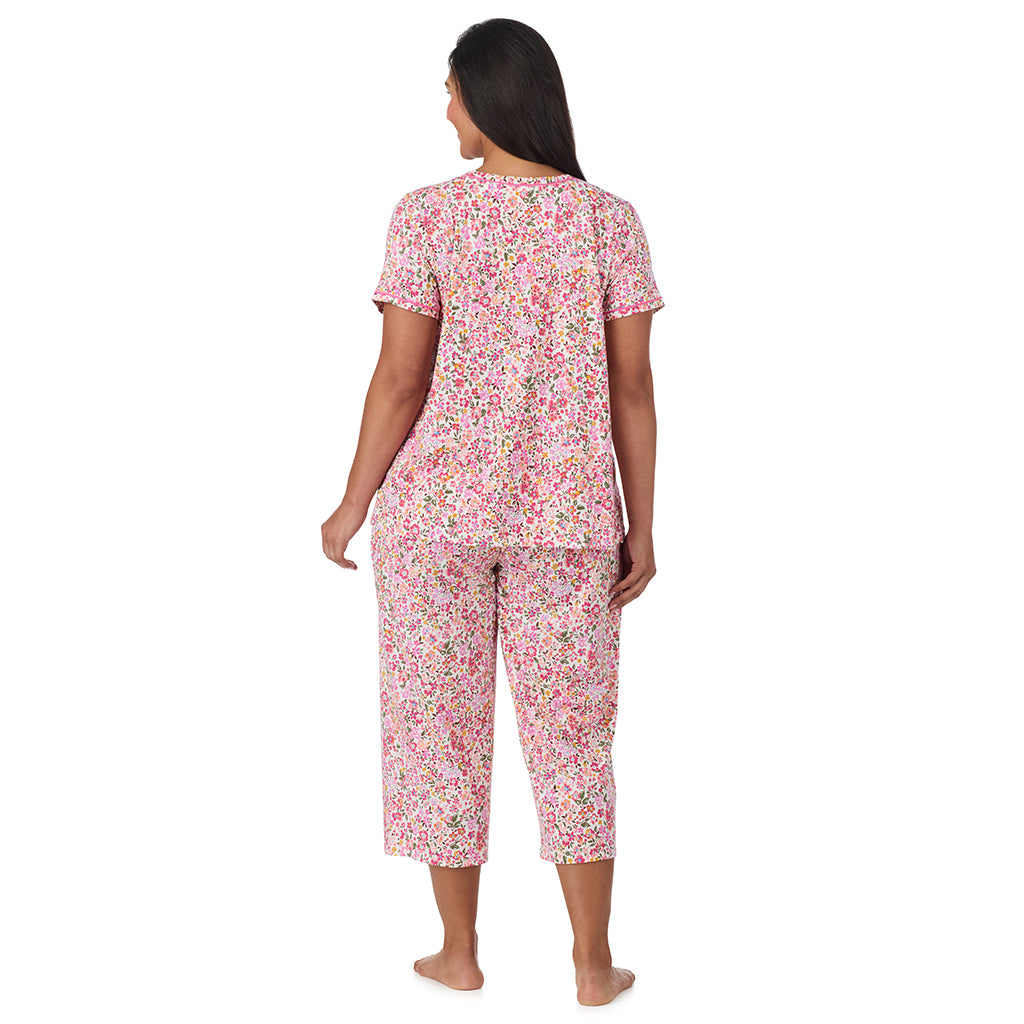 A lady wearing plus size Cotton-Blend Short Sleeve Top with Cropped Pant Pajama Set PLUS Floral Pink Ditsy  back view