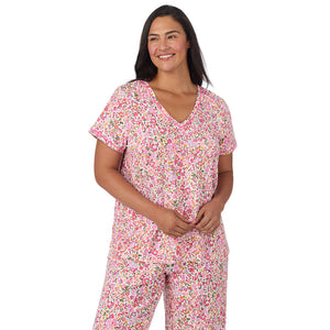 A lady wearing Cotton-Blend Short Sleeve Top with Cropped Pant Pajama Set PLUS in Floral Pink Ditsy closer look
