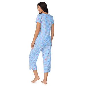A lady wearing Cotton-Blend Short Sleeve Top with Cropped Pant 2-Pc Pajama Set in Ditsy Gingham