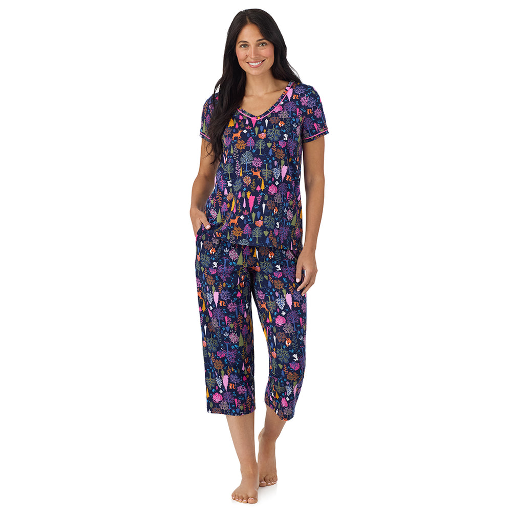 A lady wearing Cotton-Blend Short Sleeve Top with Cropped Pant Pajama Set in Navy Woodland looking front