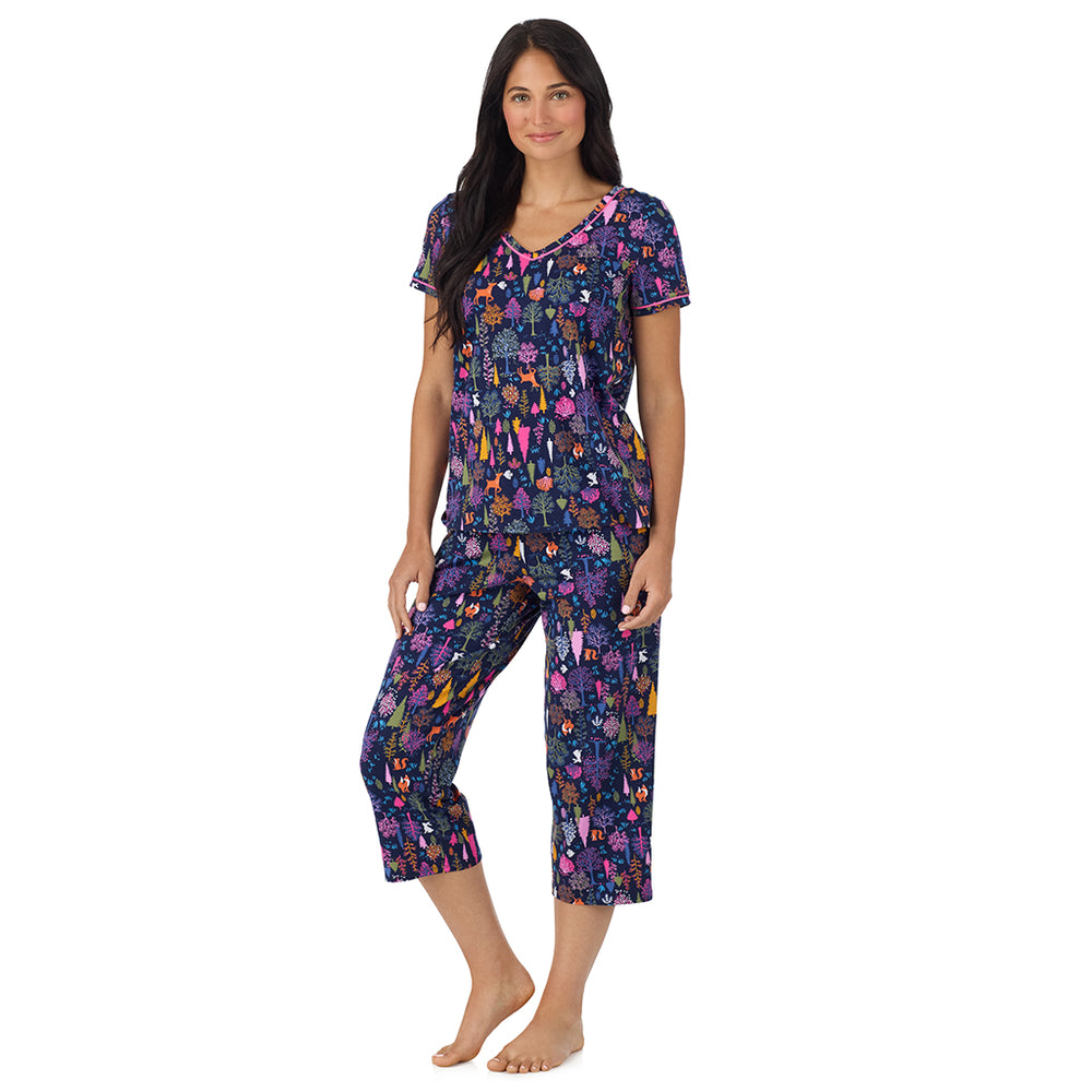 A lady wearing Cotton-Blend Short Sleeve Top with Cropped Pant Pajama Set in Navy Woodland