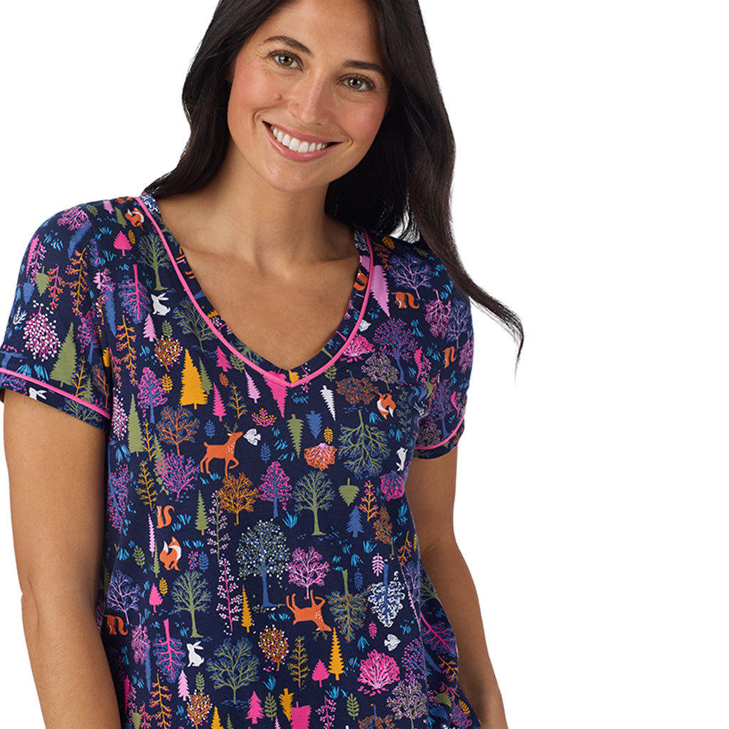 A lady wearing Cotton-Blend Short Sleeve Top with Cropped Pant Pajama Set Navy Woodland closer look