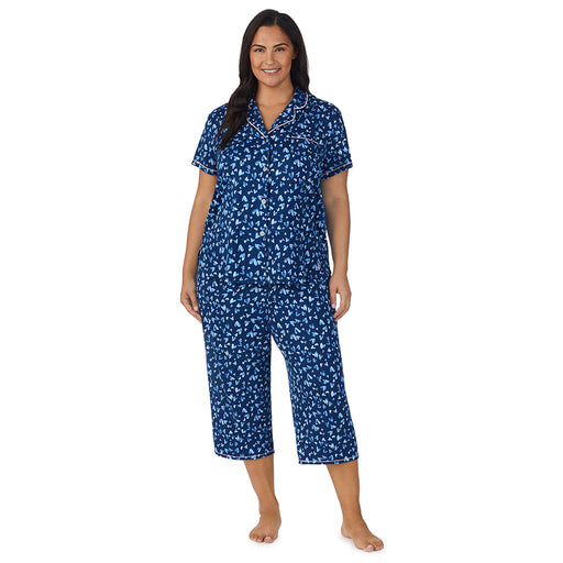 A lady wearing  Scribble Hearts Short Sleeve plus Pajama Set
