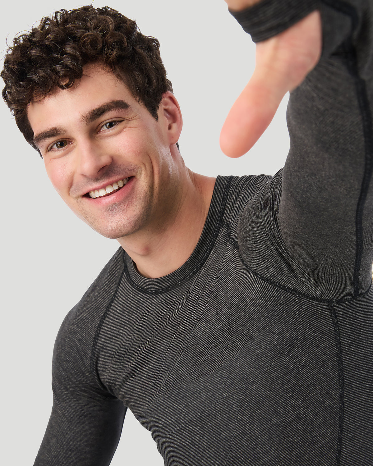  A man wearing Grey Stripe FlexStripe Long Sleeve Crew in a front view close up look