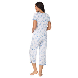 A lady wearing Cotton-Blend Short Sleeve Top with Cropped Pant 2-Pc Pajama Set in Rabbit