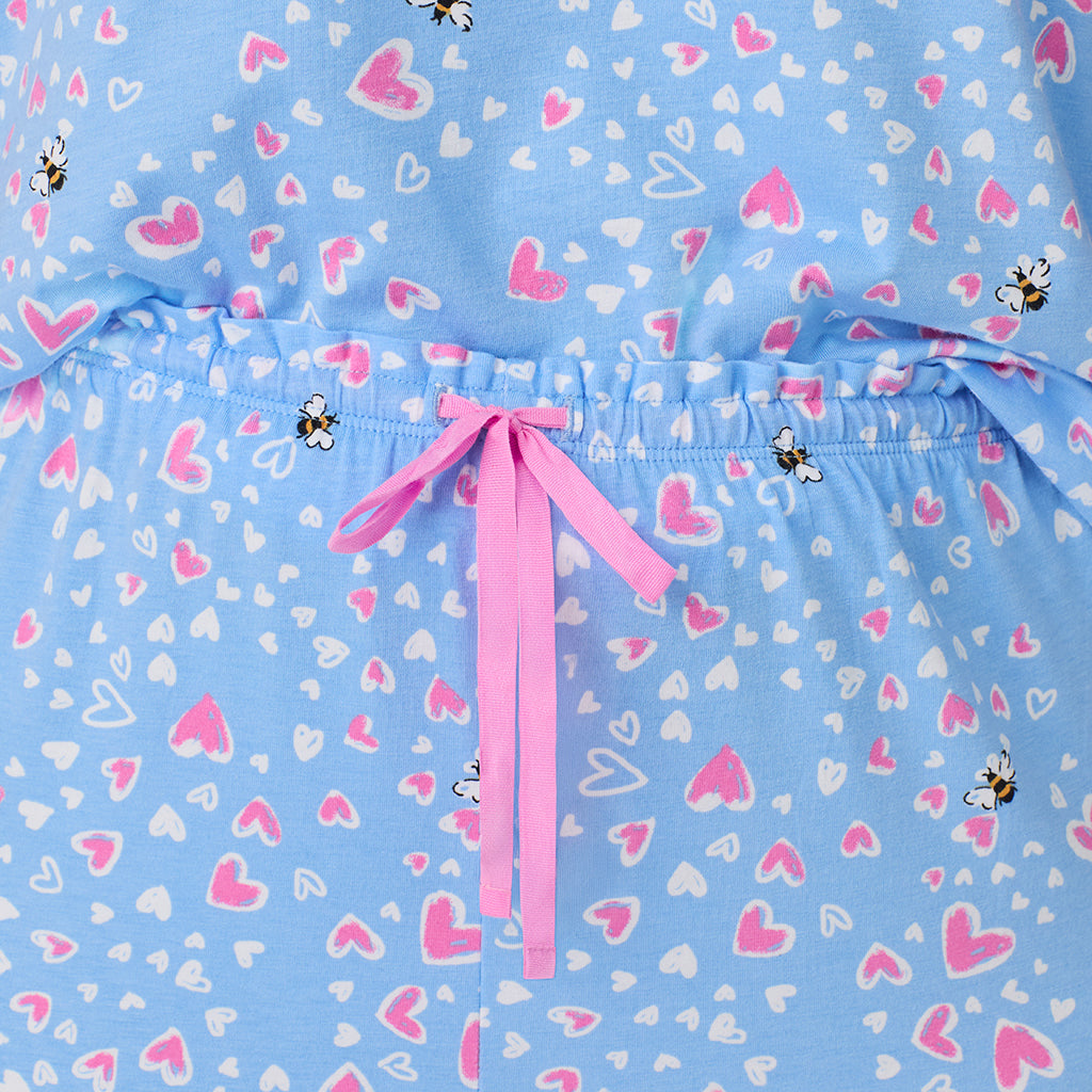 A lady wearing Cotton Rich Ruffled Short Sleeve Top with Pant Pajama Set PLUS