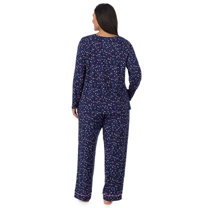 A lady wearing plus size Cotton-Blend Long Sleeve Top and Long Pant Pajama Set PLUS Navy Star Print back view