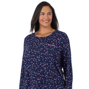 A lady wearing Cotton-Blend Short Sleeve Sleep Shirt PLUS in Navy Star Print closer look looking side