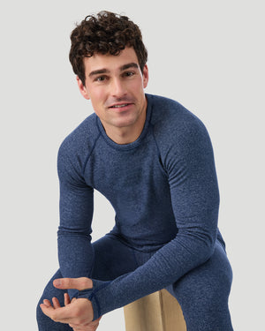  A man wearing Navy Stripe FlexStripe Long Sleeve Crew in a front sitting pose
