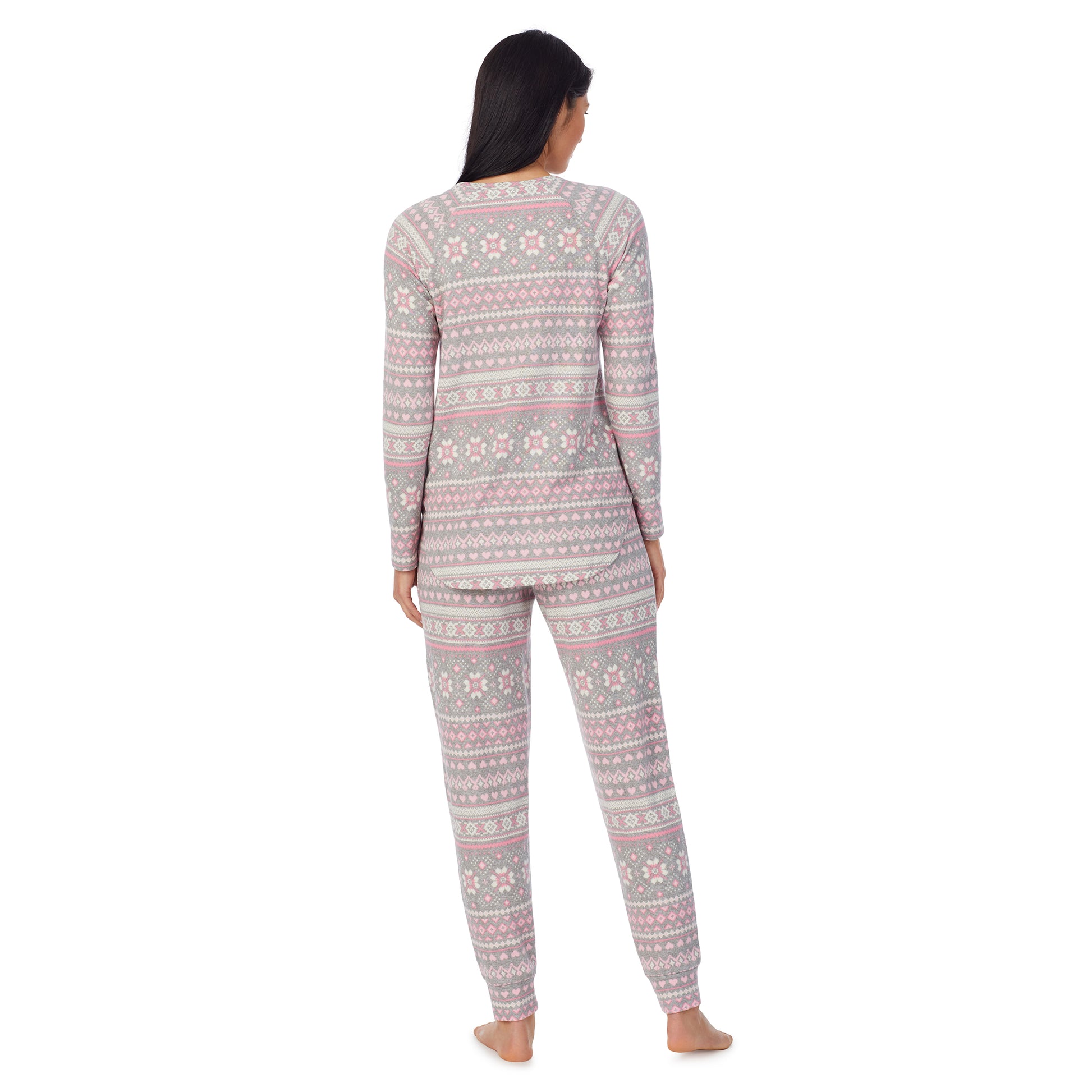 A lady wearing Brushed Sweater Knit Long Sleeve Pajama Set with animal print bottom and pink top