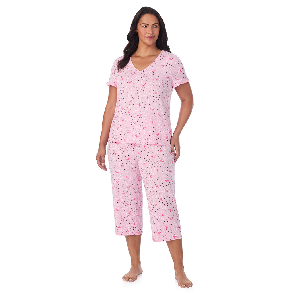 Pink Bow Dot;Model is wearing size 1X. She is 5'10", Bust 40", Waist 33", Hips 47".@A lady wearing Cotton Rich Ruffled Short Sleeve Top with Pant Pajama Set PLUS