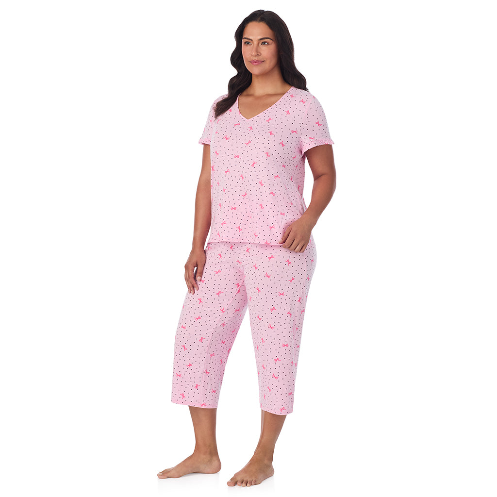 Pink Bow Dot;Model is wearing size 1X. She is 5'10", Bust 40", Waist 33", Hips 47".@A lady wearing Cotton Rich Ruffled Short Sleeve Top with Pant Pajama Set PLUS