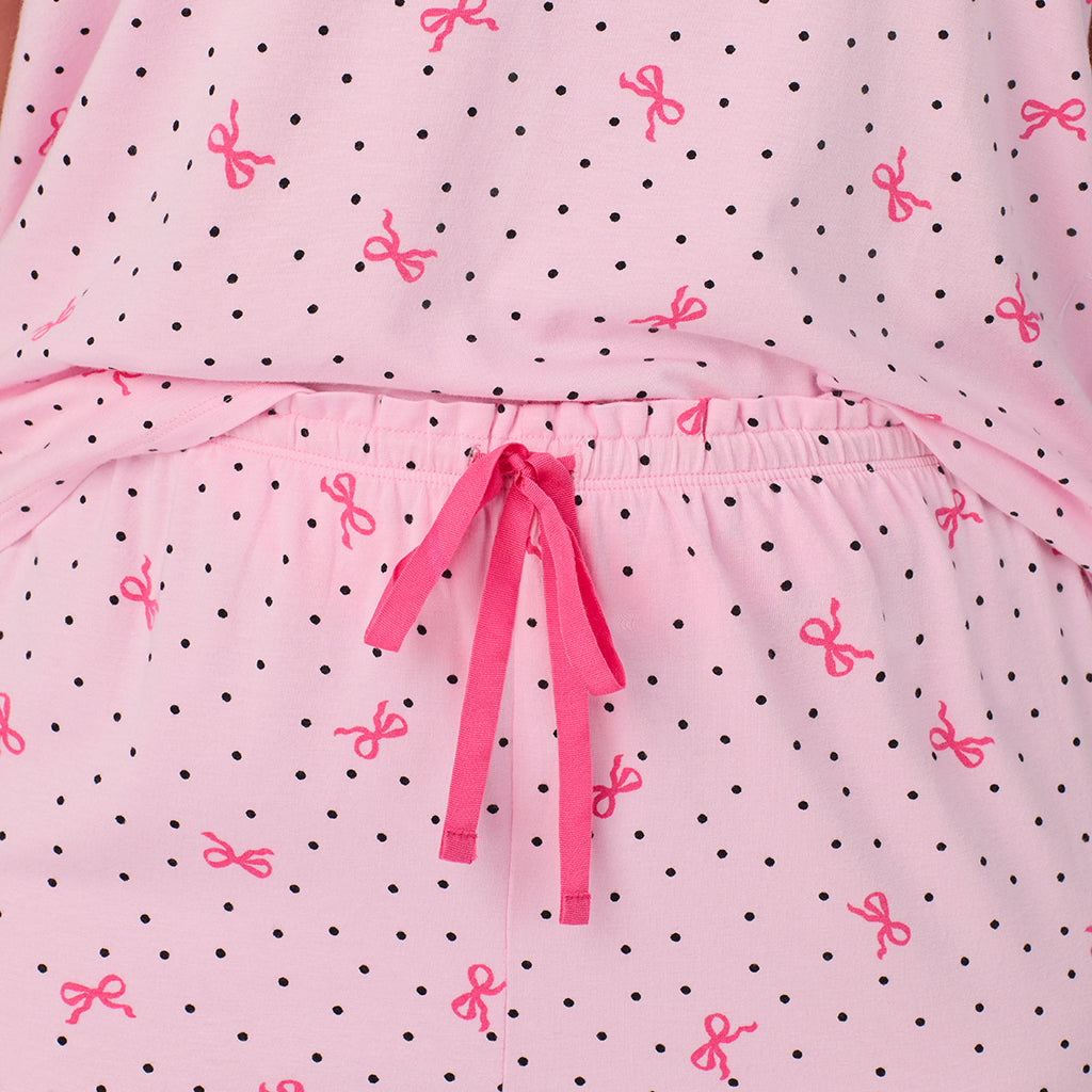 A lady wearing Cotton Rich Ruffled Short Sleeve Top with Pant Pajama Set PLUS