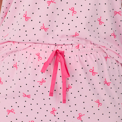 A lady wearing Cotton Rich Ruffled Short Sleeve Top with Pant Pajama Set PLUS