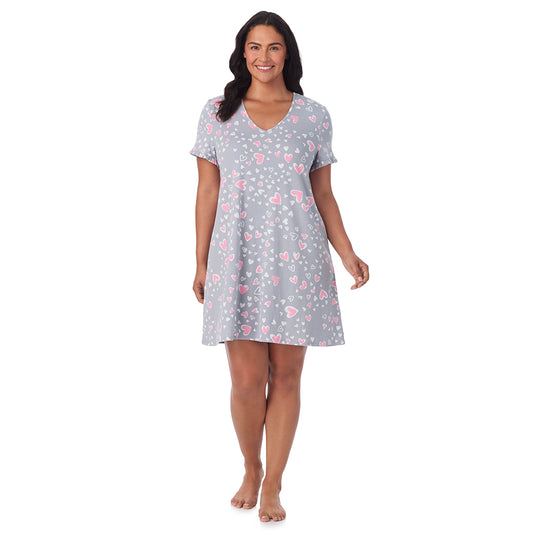 A lady wearing Cotton Rich Ruffled Short Sleeve Sleepshirt PLUS