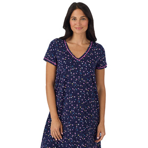 A lady wearing Cotton-Blend Short Sleeve Sleep Shirt in Navy Star Print closer look at print