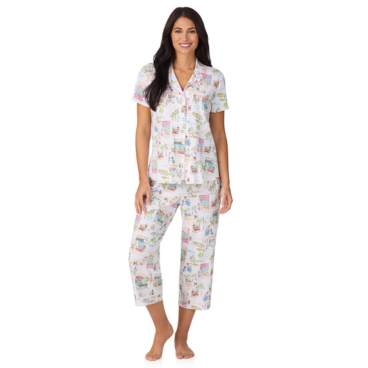 A lady wearing Cotton-Blend Short Sleeve Notch Collar with Cropped Pant 2-Pc Pajama Set in Spring Scene