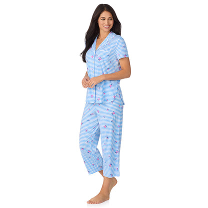 A lady wearing Cotton-Blend Short Sleeve Notch Collar with Cropped Pant 2-Pc Pajama Set in Ditsy Gingham