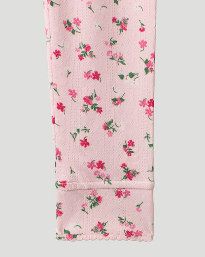  A Pink Ditsy Floral Girls Pointelle Knit 2 pc. Long Sleeve Crew &amp; Pant Set featured in a detail close up shot of the sleeve hem