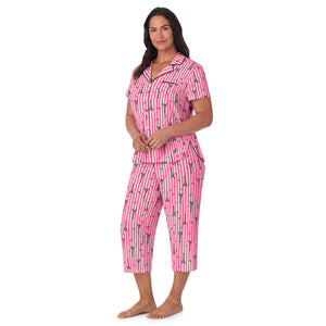 A lady wearing Cotton Rich Short Sleeve Notch Collar Top with Cropped Pant Pajama Set PLUS