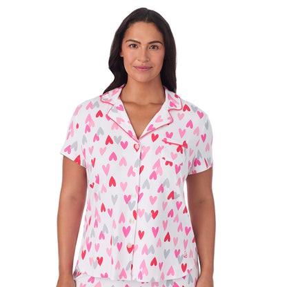 A lady wearing Cotton Rich Short Sleeve Notch Collar Top with Cropped Pant Pajama Set PLUS