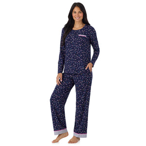 A lady wearing Cotton-Blend Long Sleeve Top and Long Pant Pajama Set in Navy Star Print