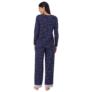 A lady wearing Cotton-Blend Long Sleeve Top and Long Pant Pajama Set in Navy Star Print back view