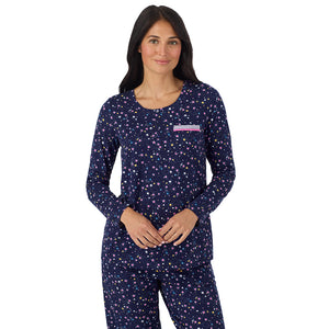 A lady wearing Cotton-Blend Long Sleeve Top and Long Pant Pajama Set in Navy Star Print closer look hand together