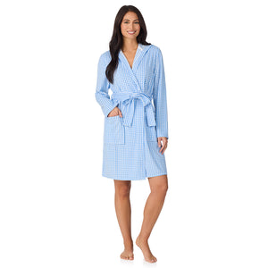 A lady wearing Vintage Terry Wrap Robe with Hood in Gingham
