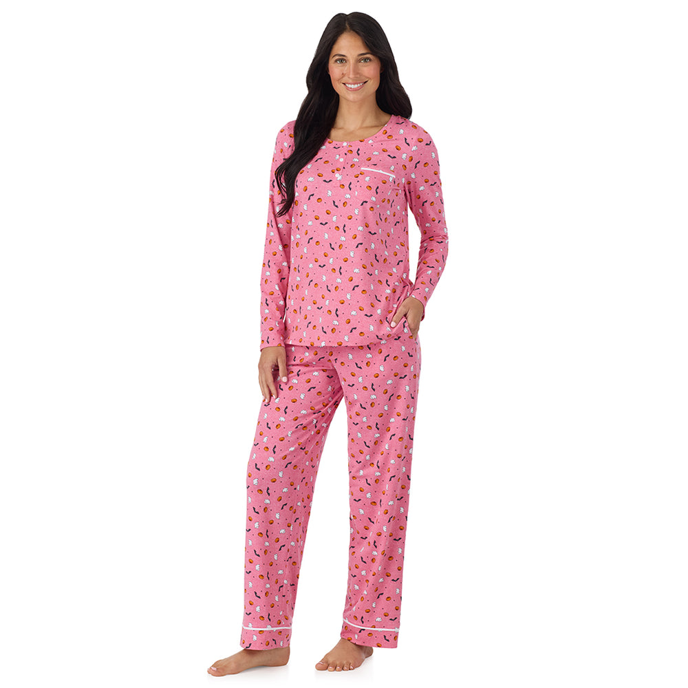 A lady wearing Cotton-Blend Long Sleeve Top and Long Pant Pajama Set in Pink Halloween
