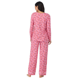 A lady wearing Cotton-Blend Long Sleeve Top and Long Pant Pajama Set in Pink Halloween back view