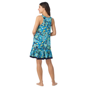  A lady wearing Cotton-Blend Sleeveless Sleep Chemise in Blue Floral posing back view pose