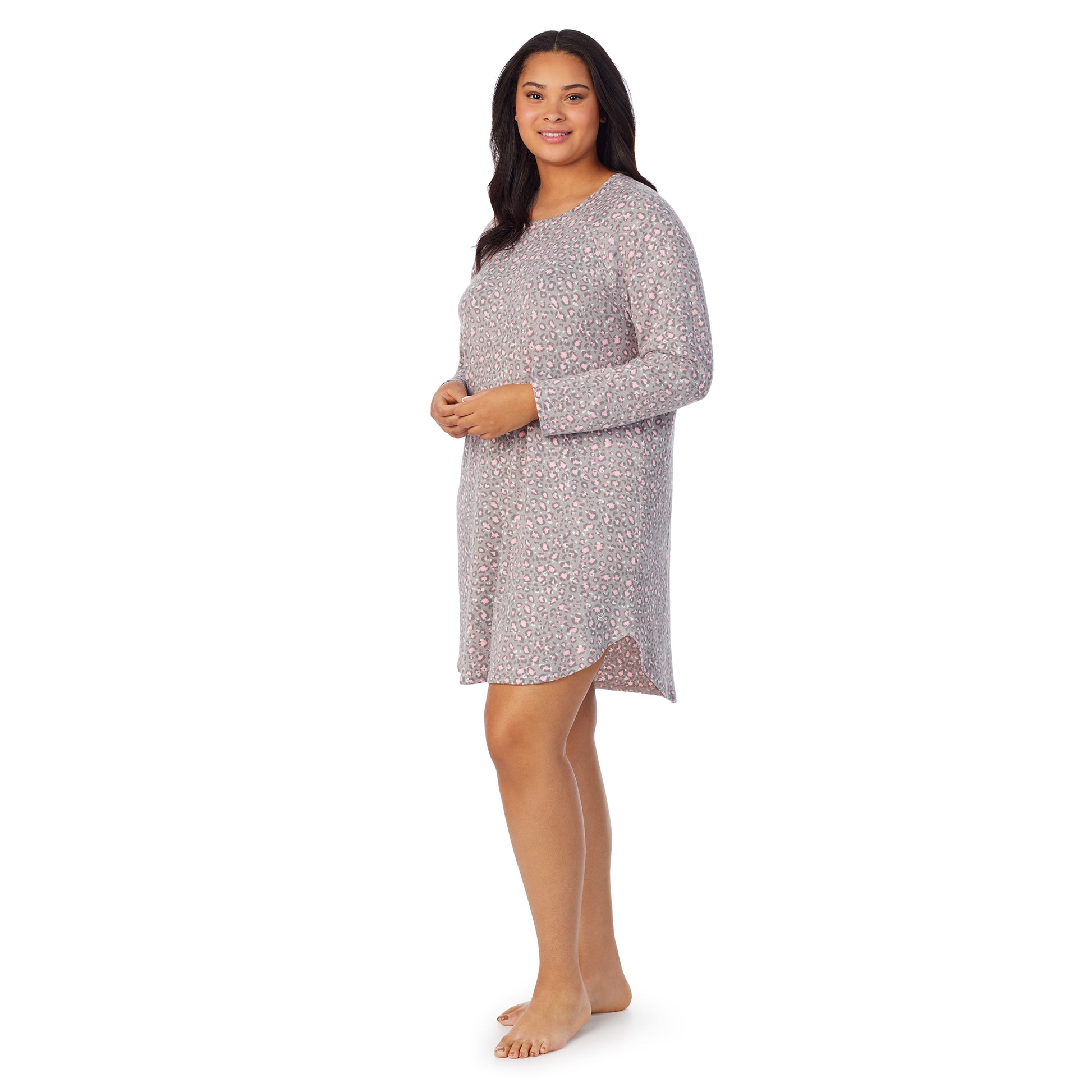 A lady wearing grey pink animal long sleeve brushed sweater knit plus sleepshirt.