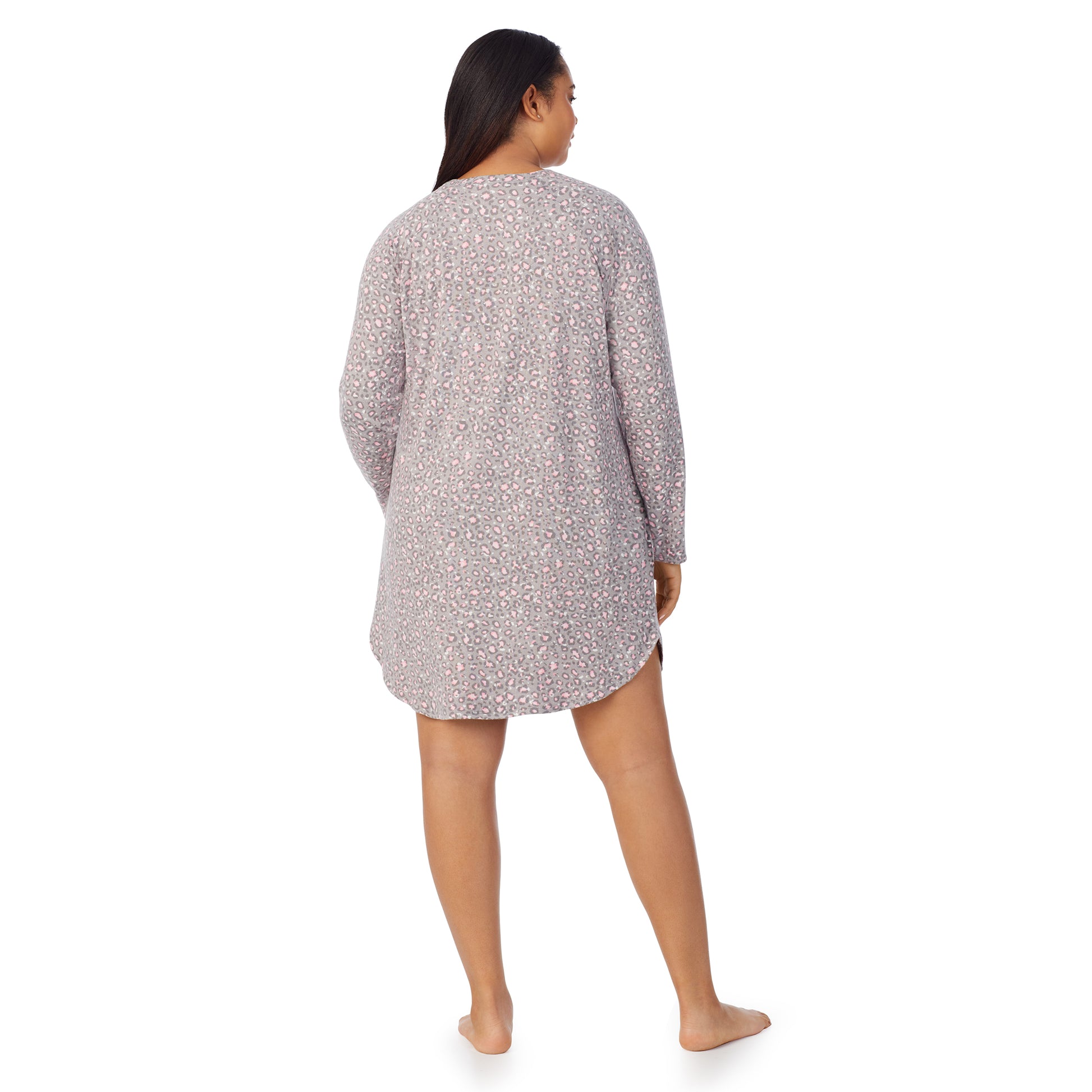 A lady wearing grey pink animal long sleeve brushed sweater knit plus sleepshirt.