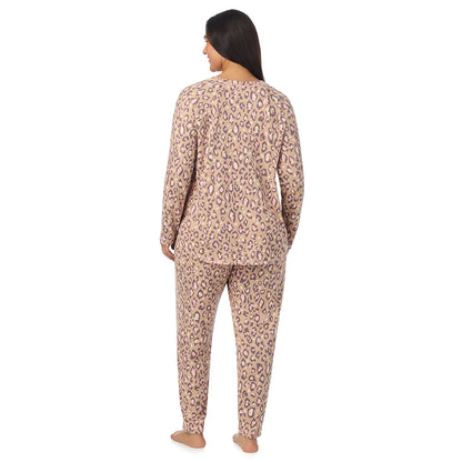 Natural Animal;Model is wearing size 1X. She is 5'10", Bust 40", Waist 33", Hips 47".@A lady wearing Natural Animal Brushed Sweater Knit Long Sleeve Pajama Set PLUS