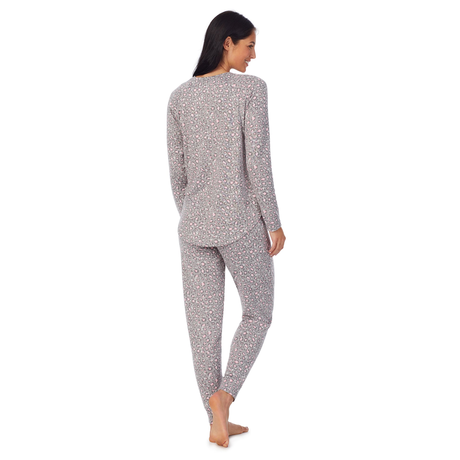 A lady wearing Brushed Sweater Knit Long Sleeve Pajama Set with grey animal print