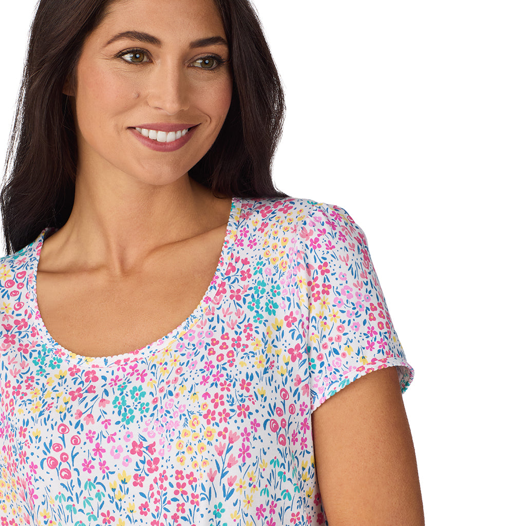 Ditsy Floral Print; Model is wearing size S. She is 5'8.5", Bust 32", Waist 25", Hips 36". @A lady wearing Cotton-Blend Short Sleeve Top with Cropped Pant with Scallop Detail 2-Pc Pajama Set in Ditsy Floral Print
