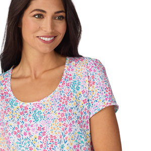 A lady wearing Cotton-Blend Short Sleeve Top with Cropped Pant with Scallop Detail 2-Pc Pajama Set in Ditsy Floral Print