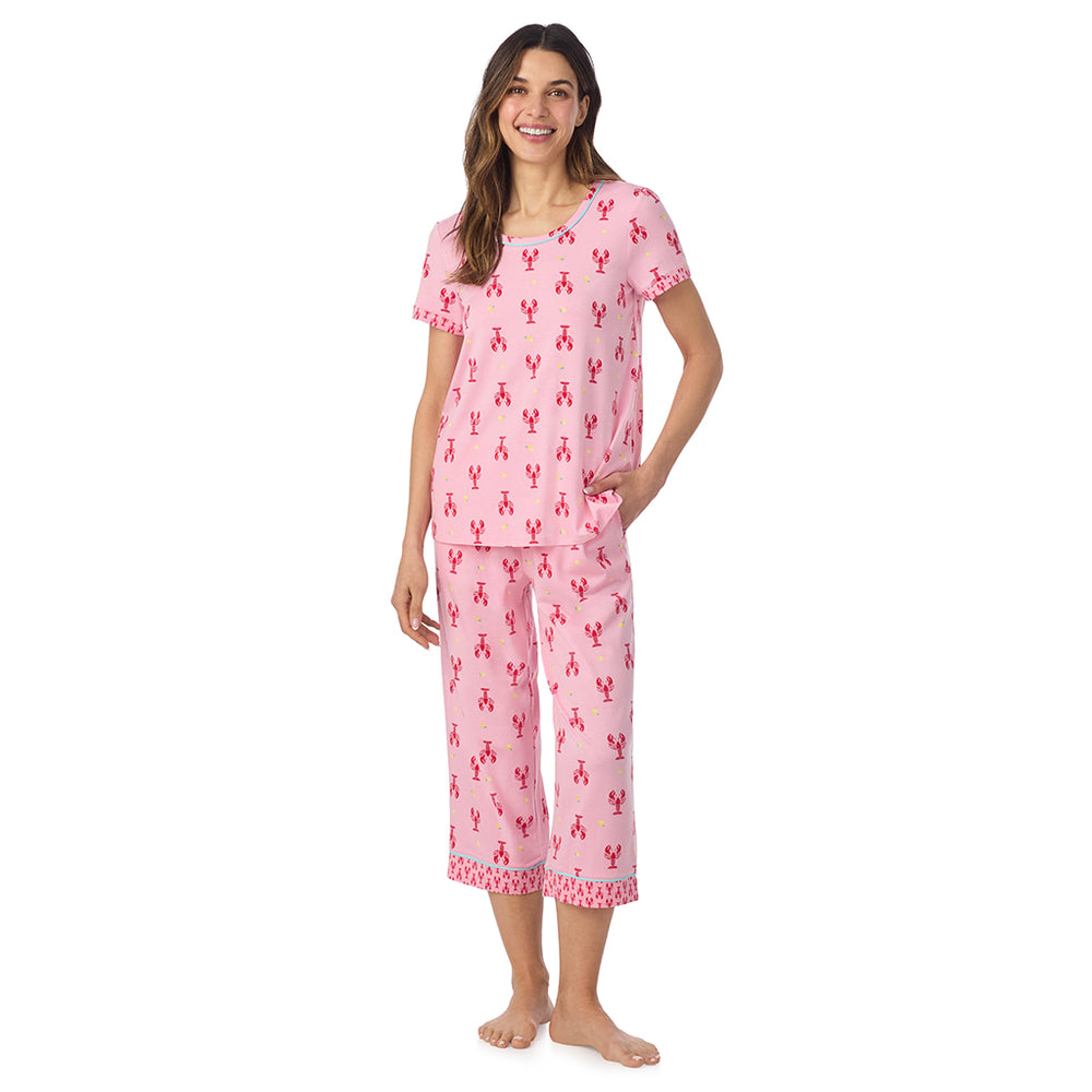 A lady wearing Cotton-Blend Short Sleeve Top and Cropped Pant Pajama Set in Lobster posing front view pose