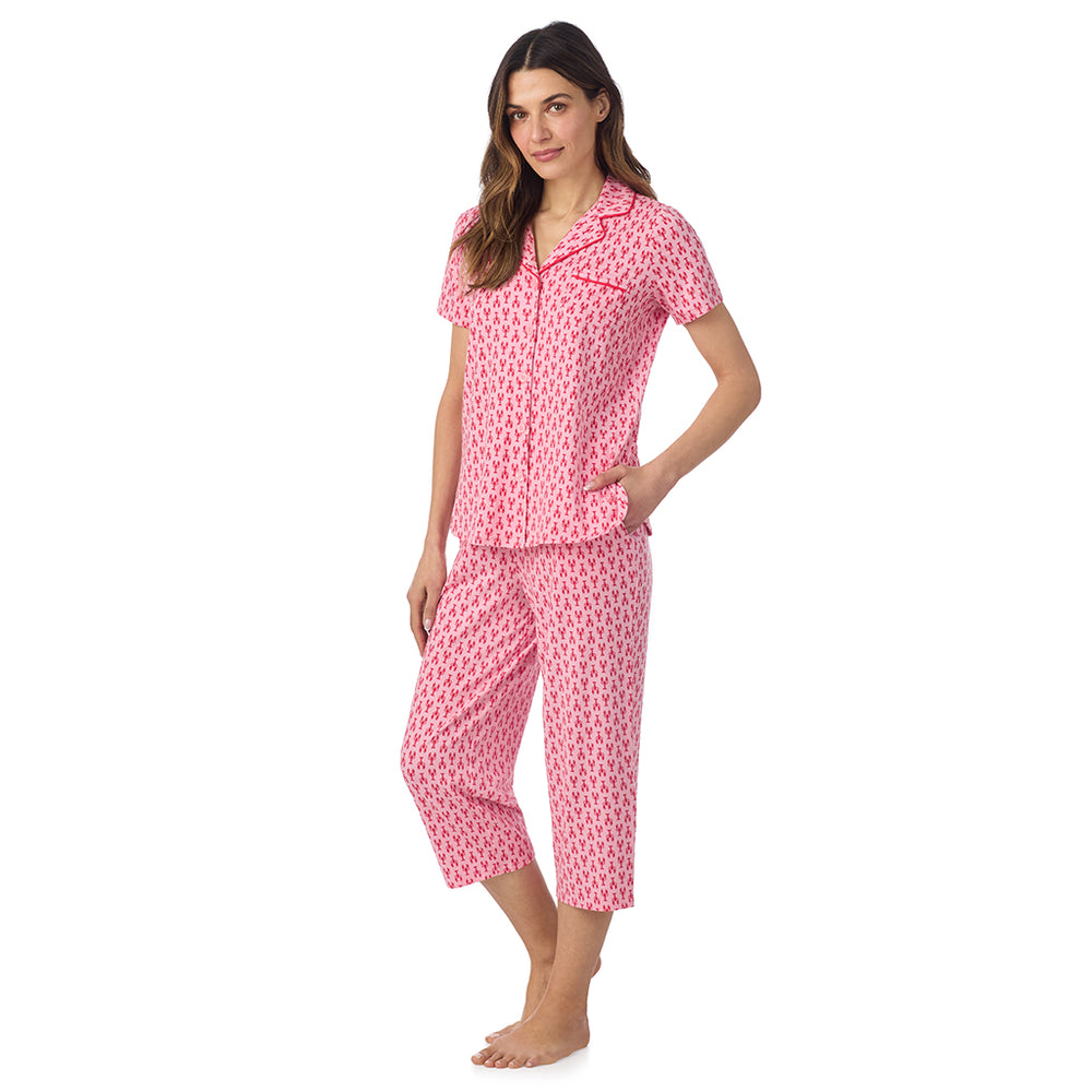 A lady wearing Cotton-Blend Short Sleeve Notch Collar with Cropped Pant Pajama Set in Mini Lobster posing side angle view pose
