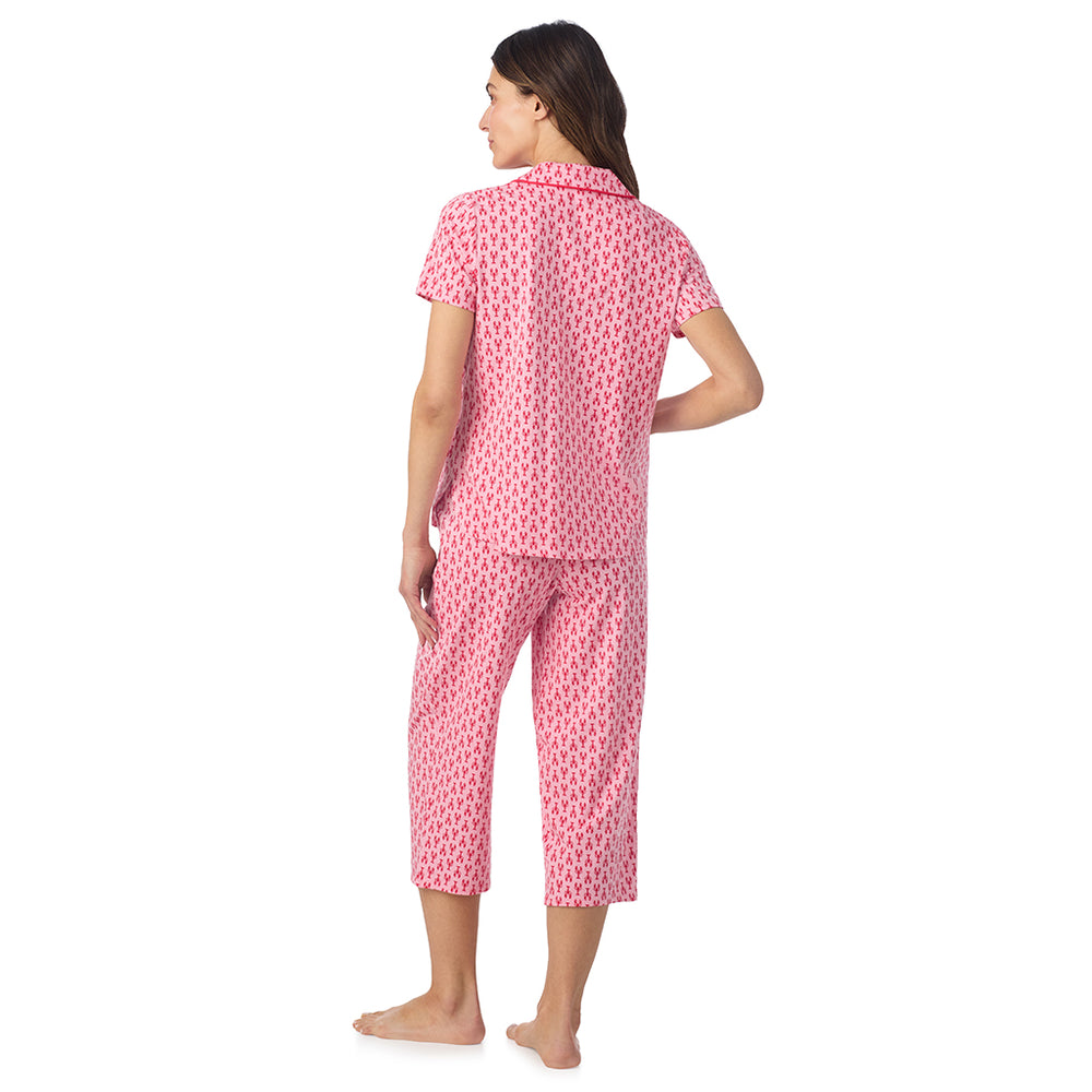 A lady wearing Cotton-Blend Short Sleeve Notch Collar with Cropped Pant Pajama Set in Mini Lobster posing back view pose