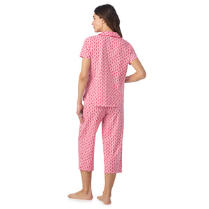  A lady wearing Cotton-Blend Short Sleeve Notch Collar with Cropped Pant Pajama Set in Mini Lobster posing back view pose