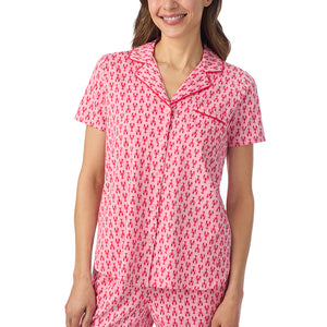  A lady wearing Cotton-Blend Short Sleeve Notch Collar with Cropped Pant Pajama Set in Mini Lobster posing close up view pose