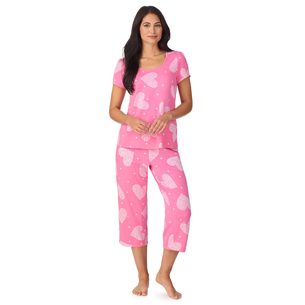 A lady wearing Cotton-Blend Short Sleeve Top with Cropped Pant with Scallop Detail 2-Pc Pajama Set in Ditsy Floral Print